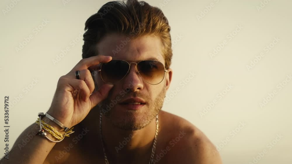 Handsome guy with sunglass smiling 