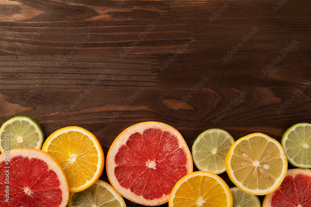 citrus fruits on wooden background. copy space. citrus fruits on wooden background. copy space.