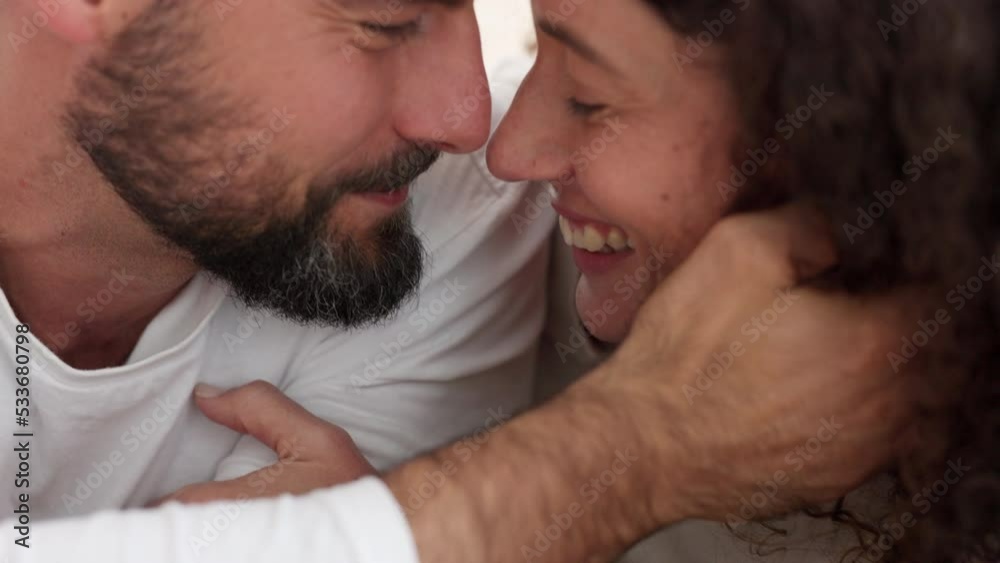 Happy, love and trust couple of man and woman smile bonding for commitment, care and partnership together. Intimate, passion and romantic people or married young lovers celebrate marriage happiness Happy, love and trust couple of man and woman smile bonding for commitment, care and partnership together. Intimate, passion and romantic people or married young lovers celebrate marriage happiness