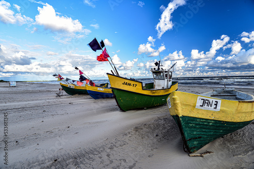 Fototapeta Naklejka Na Ścianę i Meble -  kuter rybacki, morze bałtyckie, Baltic Sea, plaża, chmury, Jantar, Polska