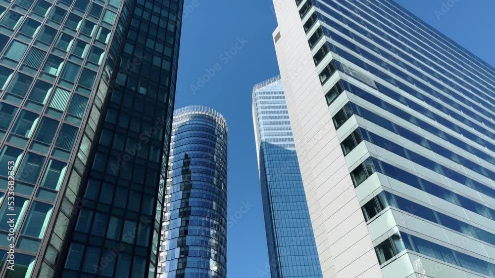 Office building windows building with many corporate offices of success companies. Corporate business, high skyscraper glass surface Office building windows building with many corporate offices of success companies. Corporate business, high skyscraper glass surface