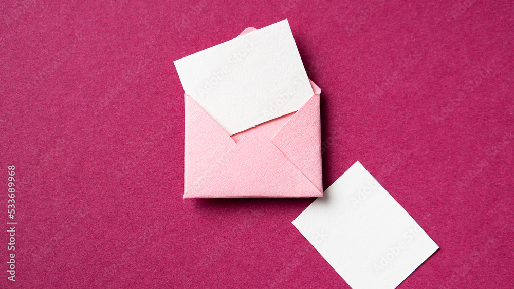 Blank white card with pink paper envelope template mockup Blank white card with pink paper envelope template mockup
