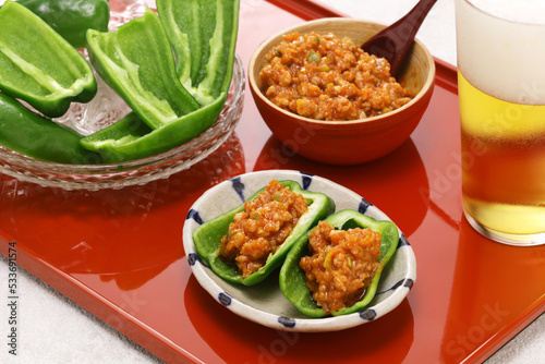 chilled fresh green peppers and Niku Miso (ground pork miso dip), a Japanese appetizer photo
