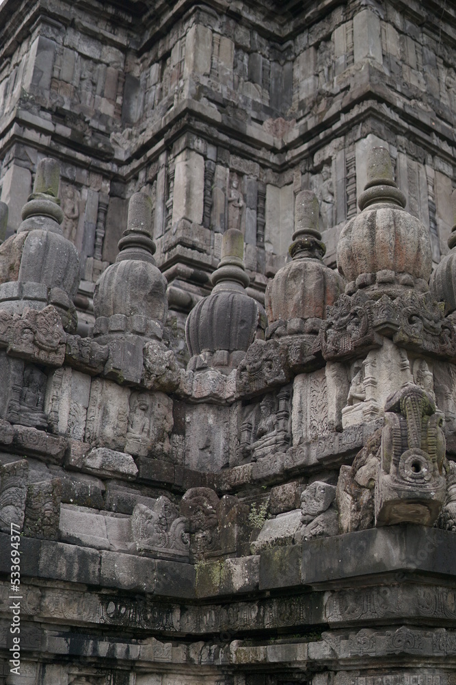 Detailed reliefs and beautiful ornaments on Prambanan Temple. This Hindu temple is a famous historical tourism in Indonesia.
