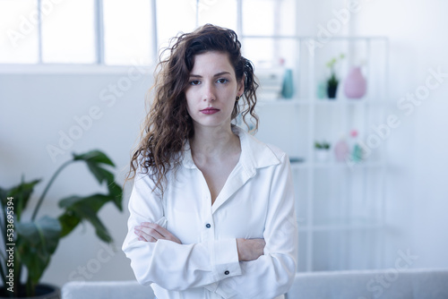 Εκτύπωση καμβά frustrated young woman with arms crossed looking unhappy at the camera