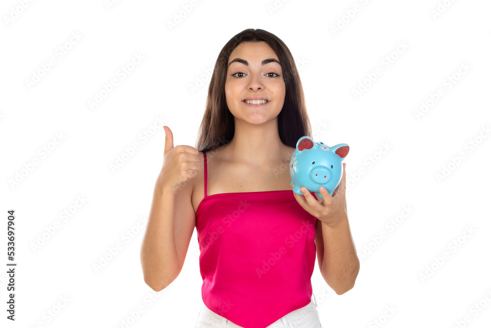 Teenager girl wearing pink top standing with piggy bank money box Teenager girl wearing pink top standing with piggy bank money box