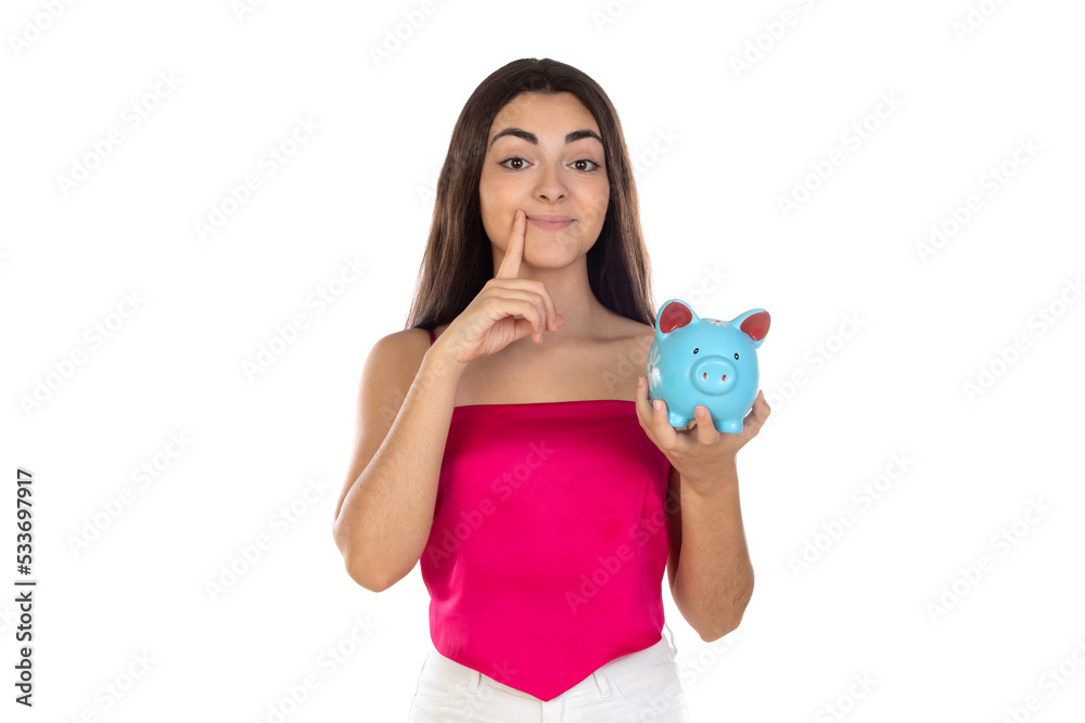 Teenager girl wearing pink top standing with piggy bank money box Teenager girl wearing pink top standing with piggy bank money box