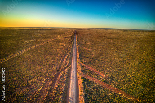 Aerial view along the Tanami Road at coordinates -20.885365, 130.620762. Northern Territory, Australia. August 2022.
