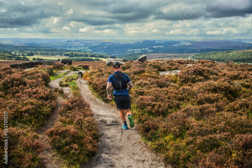 Print op canvas Fell runner descending from Burbage Edge in the Peak district