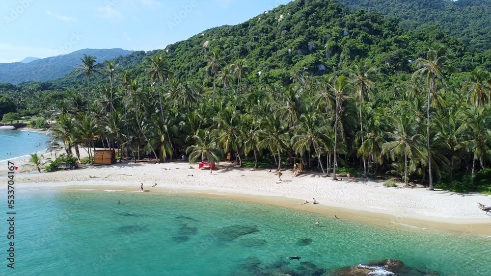 Santa Marta Colombia , Tayrona Natural Park Caribbean sea Cabo San Juan  - Drone aerial view of amazing  sand beach and  forest - Tourist attraction for relax and enjoy the paradise of the ocean sea 