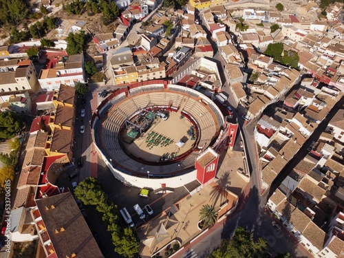 Aerial shot of the Caravaca De la Cruz town with a bullring (plaza de toros)