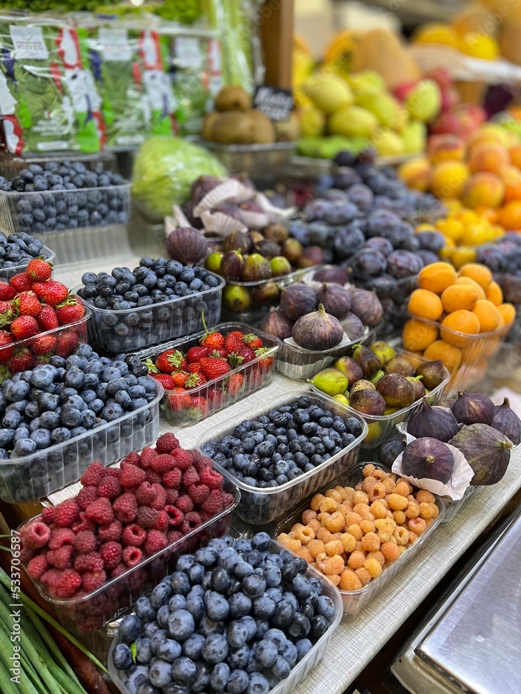 fruit and berries on market stall