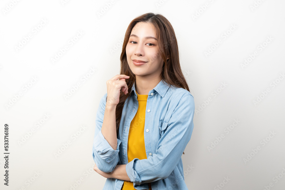 happy young asian woman smiling isolated on background. happy young asian woman smiling isolated on background.