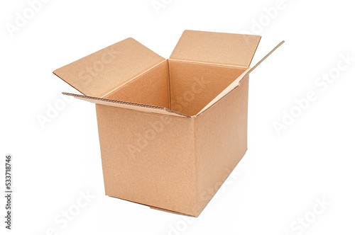 Open cardboard box close up isolated on a white background © unclepodger