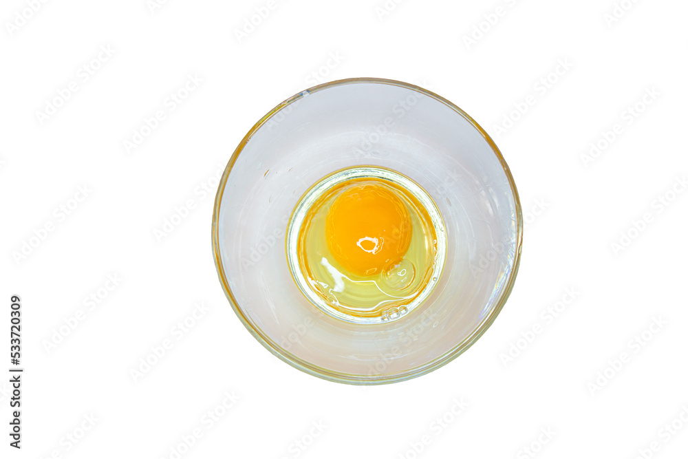 Raw egg yolk in bowl isolated on white background, top view Raw egg yolk in bowl isolated on white background, top view