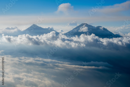 Two volcanoes in the clouds. View of Volcan de Fuego and Volcan Acatenango from the top of Volcan de Agua. © Natalia