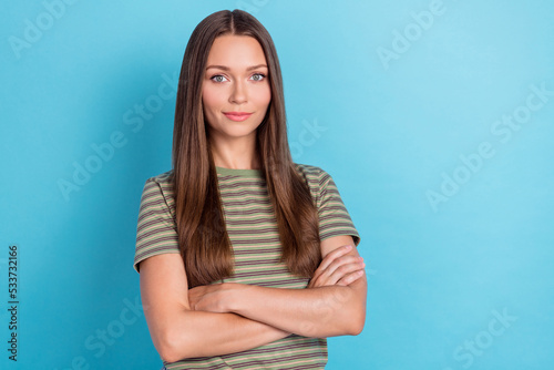 Closeup photo of young pretty confident professional worker manager folded hands nice experienced empty space ad isolated on blue color background