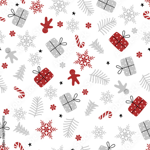 Seamless christmas pattern with gifts, christmas tree, gingermans, snowflakes, candy cane and stars. photo