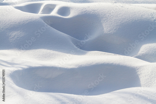 clear snowy white mounds on a winter day