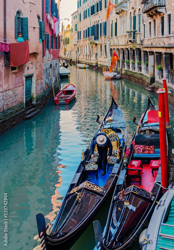 Gandolas and small boats in Venice's inner canal. Italy, 2019