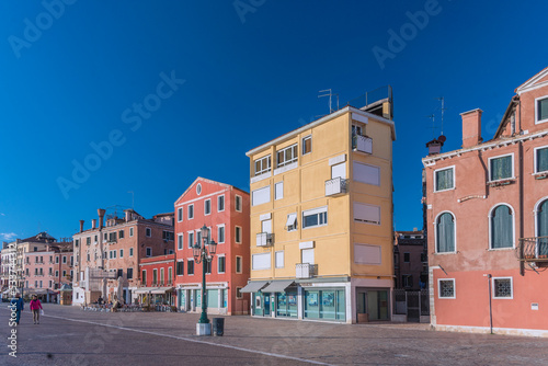 The Riva Degli Schiavoni was built in the 19th century and it is a promenade that sits on the waterfront at St. Mark's Basin and main pedestrian street, often overcrowded of tourists in Venice. 2019 photo