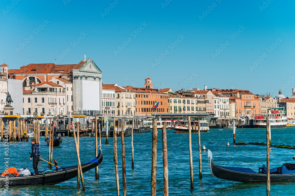 The Riva Degli Schiavoni was built in the 19th century and it is a promenade that sits on the waterfront at St. Mark's Basin and main pedestrian street, often overcrowded of tourists in Venice. 2019