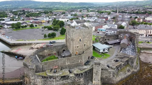 Aerial drone footage of the Carrickfergus Castle in County Antrim, Northern Ireland photo