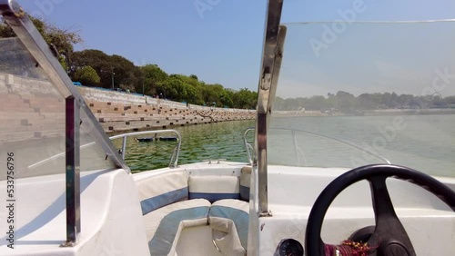 Speed boat in the lake water, Ahmedabad Kankaria Lake, front view of boat photo