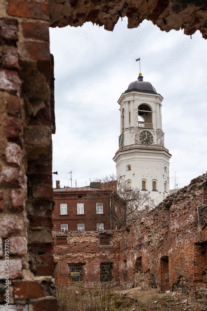 clock tower in the city of Vyborg, the bell tower of the destroyed cathedral, April 11, 2022, Vyborg, Russia