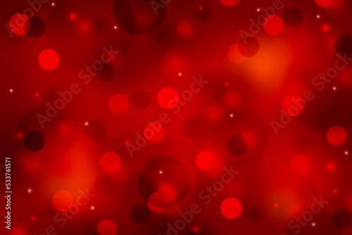 Red christmas background with abstract bokeh lights.