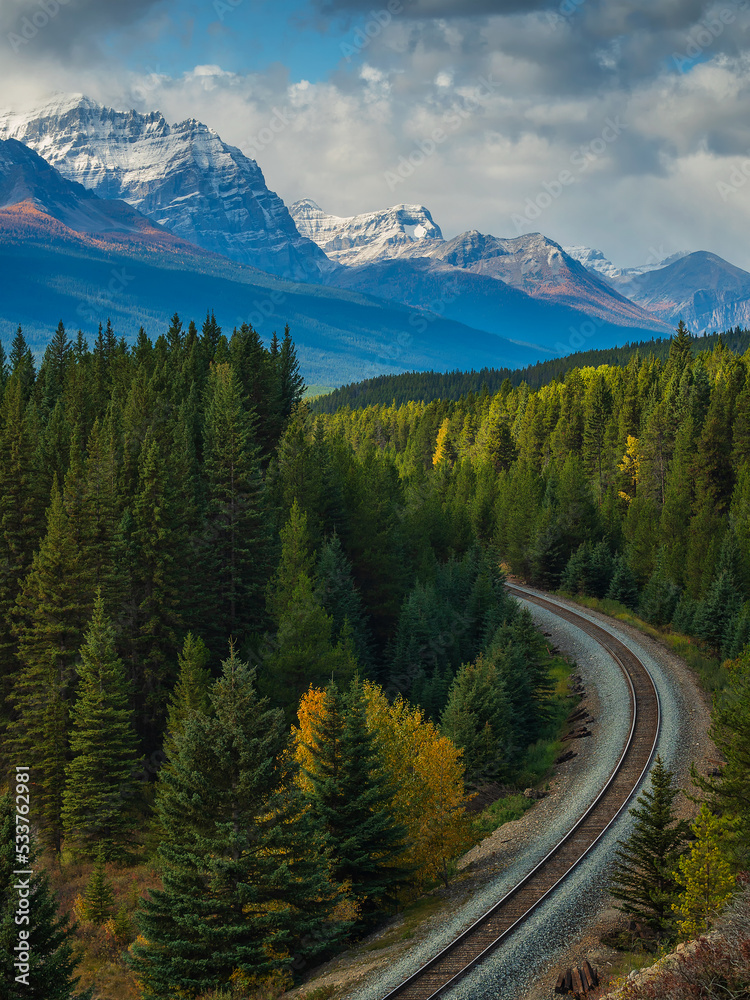 Morant's Curve is a scenic viewpoint near Lake Louise of a dramatic bend along the Bow River where trains pass through the Canadian Rockies.