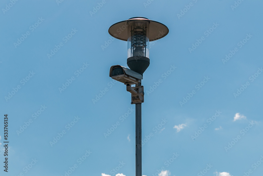 CCTV Cameras against the blue sky. Designed for visual control or automatic image analysis (automatic face recognition). Close-up. CCTV Cameras against the blue sky. Designed for visual control or automatic image analysis (automatic face recognition). Close-up.