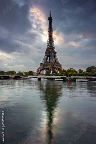 Eiffel Tower by the Seine River in Paris at sunrise. France © Patryk Kosmider