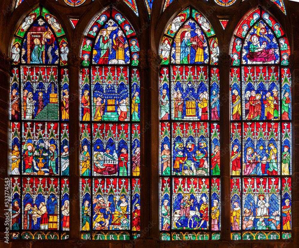 Gothic stained glass with New Testament Stories in the Strasbourg Cathedral Our Lady of Strasbourg (French: Cathédrale Notre-Dame de Strasbourg, German: Liebfrauenmünster zu Straßburg)