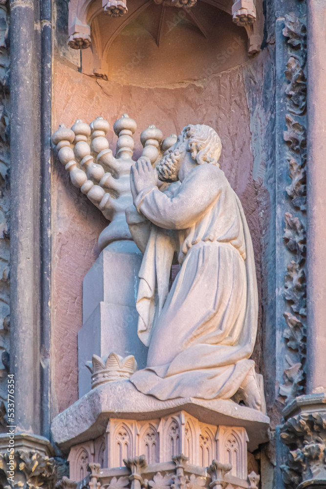 King David with the Menorah on the Gothic facade of the Strasbourg Cathedral of Our Lady (French: Cathédrale Notre-Dame de Strasbourg, German: Liebfrauenmünster zu Straßburg)