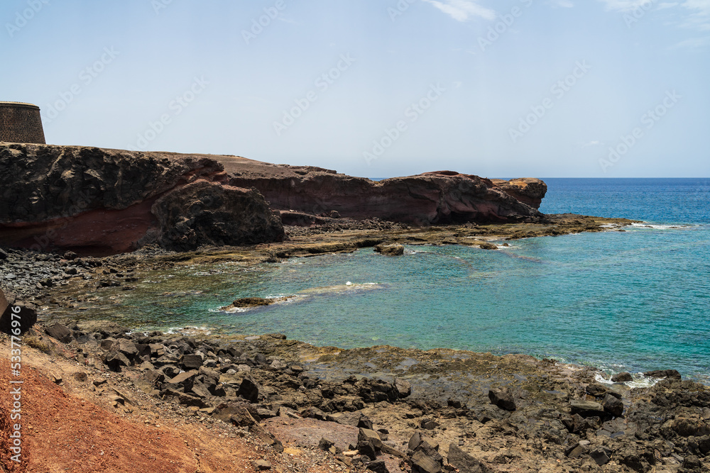Rocky coast of the Atlantic Ocean. Playa Blanca. Lanzarote. Canary Islands. Spain. Rocky coast of the Atlantic Ocean. Playa Blanca. Lanzarote. Canary Islands. Spain.