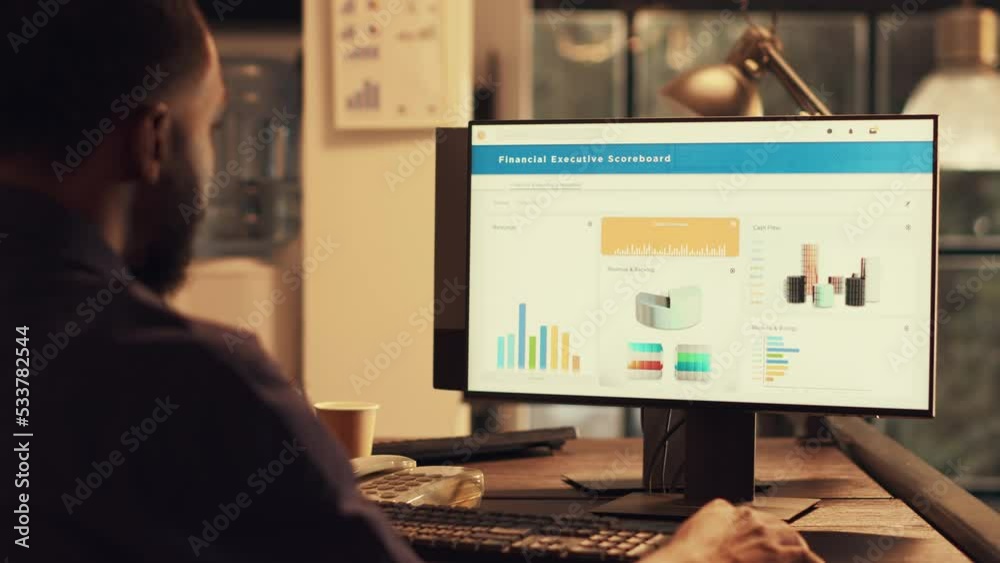 Office worker analyzing financial shares and data on computer, working with company project to create professional report. Using online network app with marketing for presentation. Office worker analyzing financial shares and data on computer, working with company project to create professional report. Using online network app with marketing for presentation.