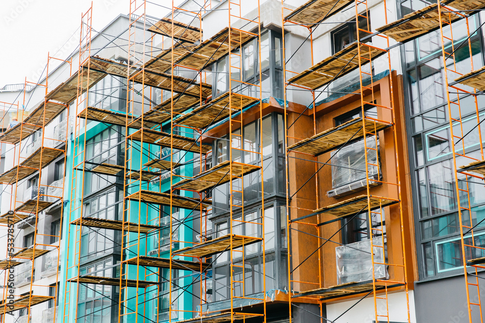 beautiful scaffolding at the construction site of a stylish apartment building