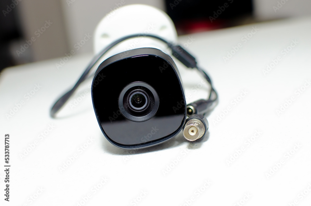 CCTV videocam, CFTV security camera, white camera with secure circuit, theft protection. Surveillance view. Camera lens, sensor and infrared. CCTV videocam, CFTV security camera, white camera with secure circuit, theft protection. Surveillance view. Camera lens, sensor and infrared.