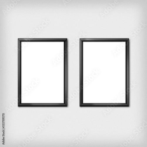 Gallery interior with two empty frames on wall © the_pixel