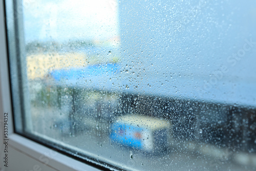 Window glass with water drops, closeup. Condensation © New Africa