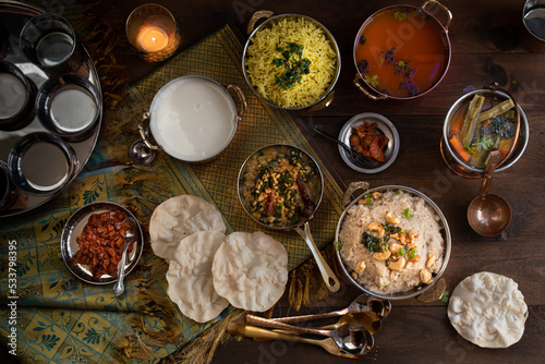South Indian vegetarian food served in traditional copper servingware photo