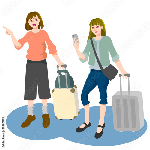 スーツケースを持って移動する旅行中の若い女性2人組、1人はスマートフォンで何かを調べており、もう1人は前方を指差している