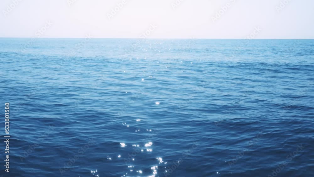 Sea waves and reflection of sunlight. Sparkling lights on sea water. Seascape background. Sea waves and reflection of sunlight. Sparkling lights on sea water. Seascape background.