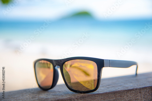 wooden glasses on the beach on holiday