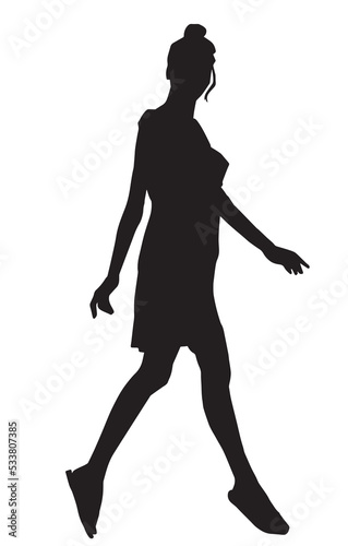 The silhouette of a sweet lady, she is standing in a sexy pose.