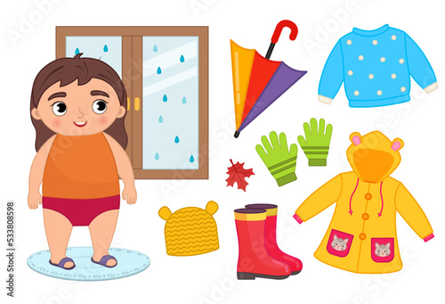 Vector set of seasonal autumn clothes for kids. Illustration of a cartoon girl looking out the window.
