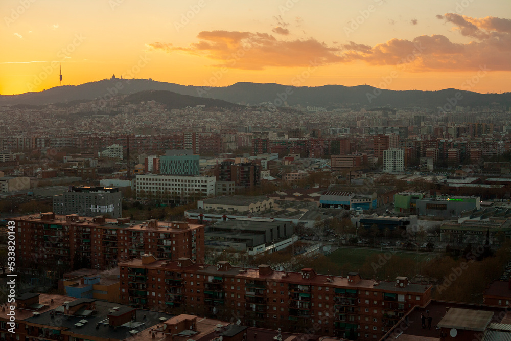 Cityscape of Barcelona and mount tibidabo during sunset