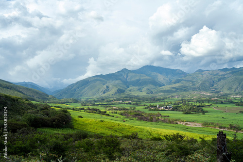 landscape of sugar cane plantations green mountains in loja, ecuador