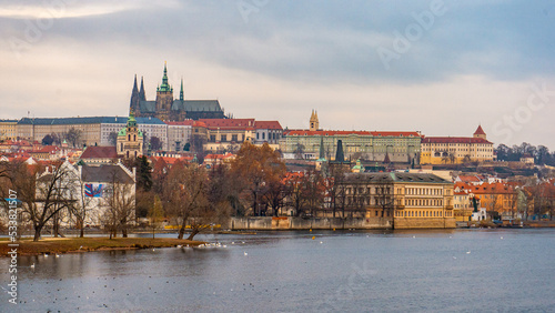 Beautiful view of Prague and Prague Castle along Vltava River . Historic and romantic old town during winter . Prague , Czech : December 12 , 2019